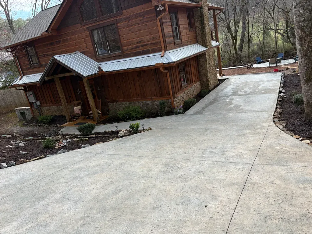 Finished concrete driveway at a cabin
